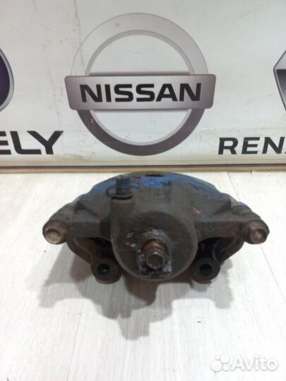 Суппорт тормозной перед Nissan almera classic B10