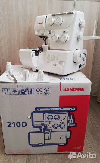 Оверлок Janome 210 d