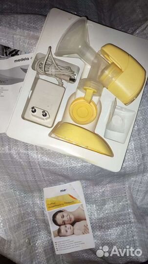 Молокоотсос электрический и стерилизатор