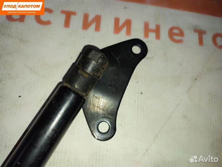 Амортизатор крышки багажника левый Volkswagen