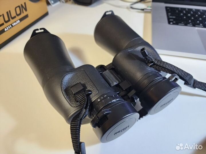 Бинокль Nikon Aculon A211 10x50 черный