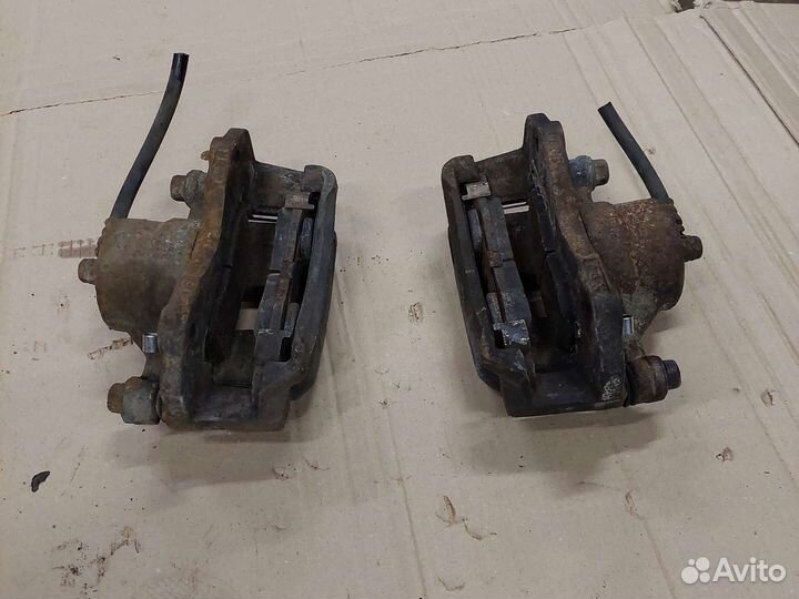 Суппорт передний левый Mitsubishi Galant 8