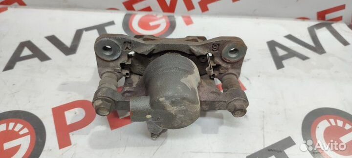 Суппорт тормозной задний левый Mitsubishi Airtrek