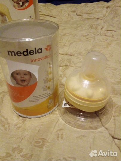Молокоотсос medela ручной + соска medela
