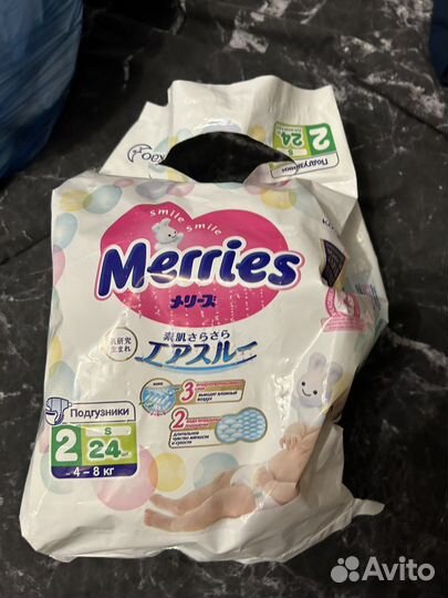 2 пакета памперсов