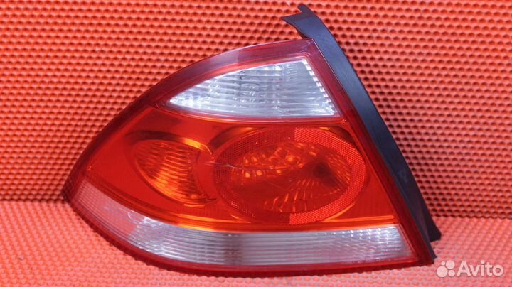 Фонарь задний левый Nissan Almera Classic B10 QG16