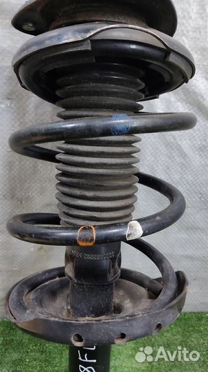 Стойка амортизатора передняя левая Subaru Foreste