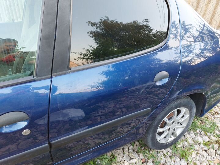 Дверь задняя левая пежо 206