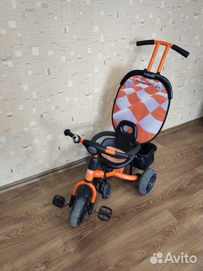 Трехколесный велосипед с ручкой