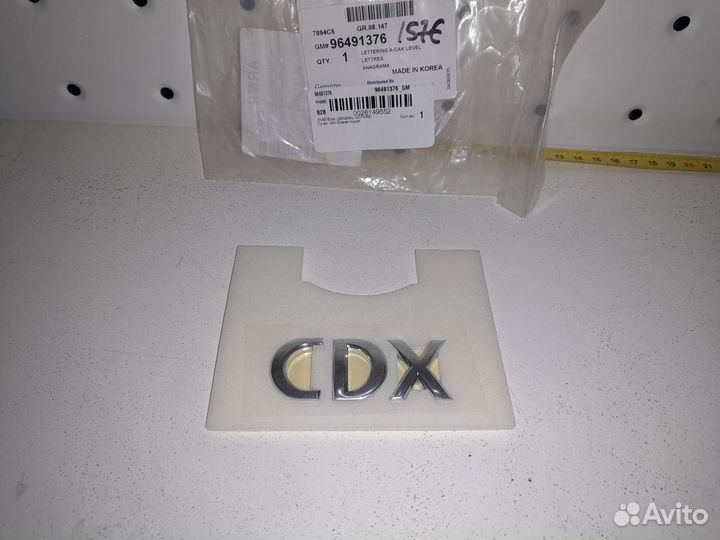 Chevrolet Evanda Шильдик CDX Новый