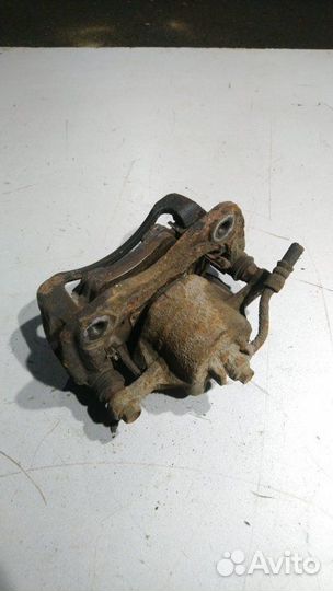 Суппорт тормозной передний левый Kia Rio 3 2013