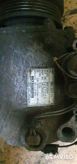 Компрессор кондиционера MN185570 Mitsubishi Lancer
