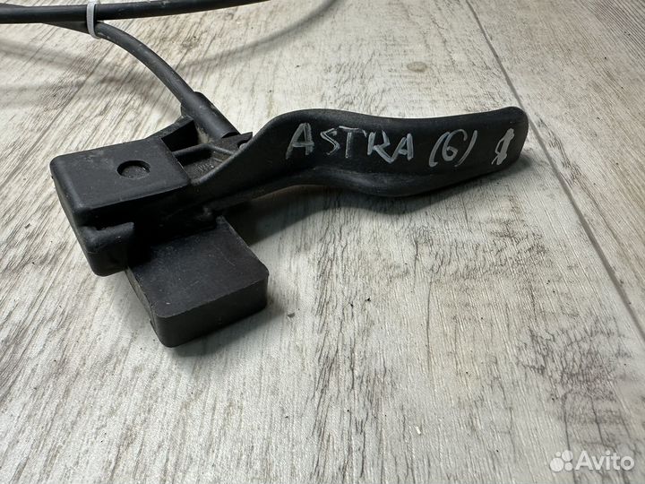 Трос открывания капота Opel Astra G