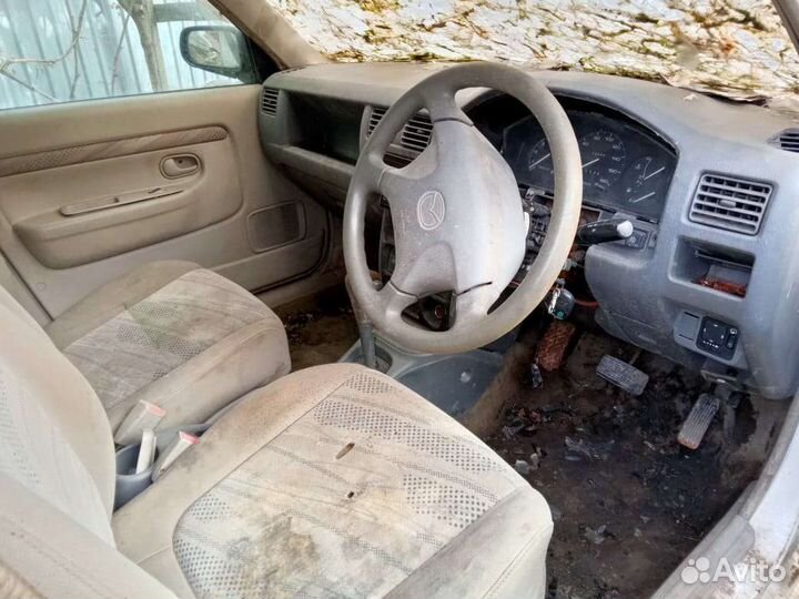 Двери на mazda деми