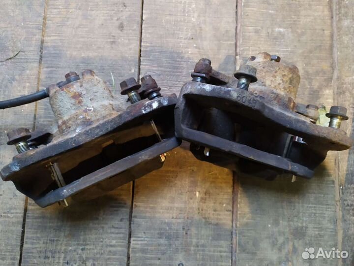 Передние Суппорта Mitsubishi lanser 9