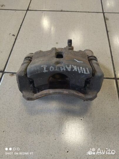 Суппорт тормозной передний левый Kia Picanto 2