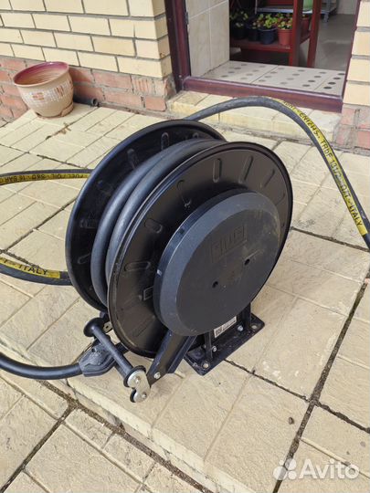 Катушка для топливозаправочного шланга