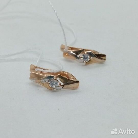 Золотые серьги с камнем