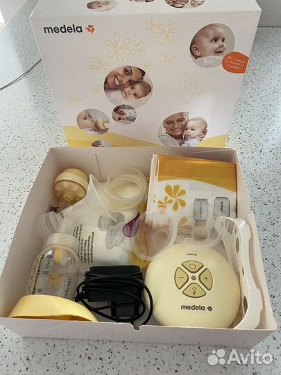 Молокоотсос medela