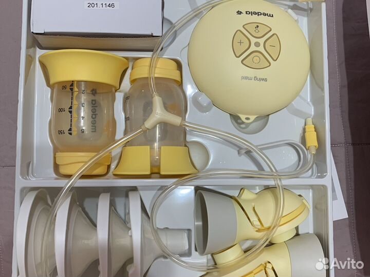 Молокоотсос medela swing maxi flex