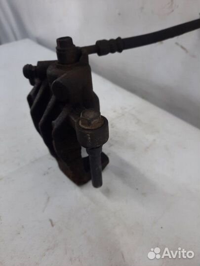 Суппорт тормозной задний левый Kia Rio хэтчбэк 5