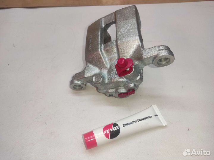 Суппорт тормозной задний лев. nissan X-trail