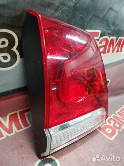 Фонарь задний левый Toyota Land Cruiser
