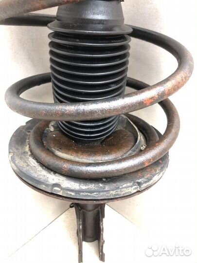 Амортизатор стойка передний левый Dodge Caravan 4