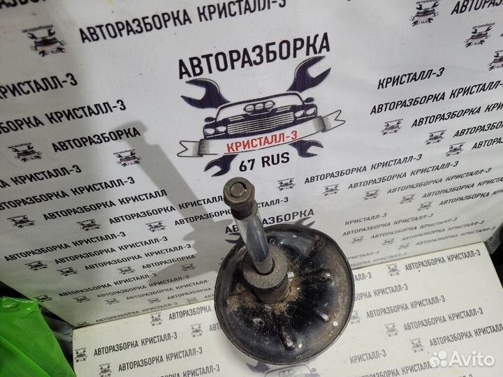 Стойка передняя правая Mazda 626 GE