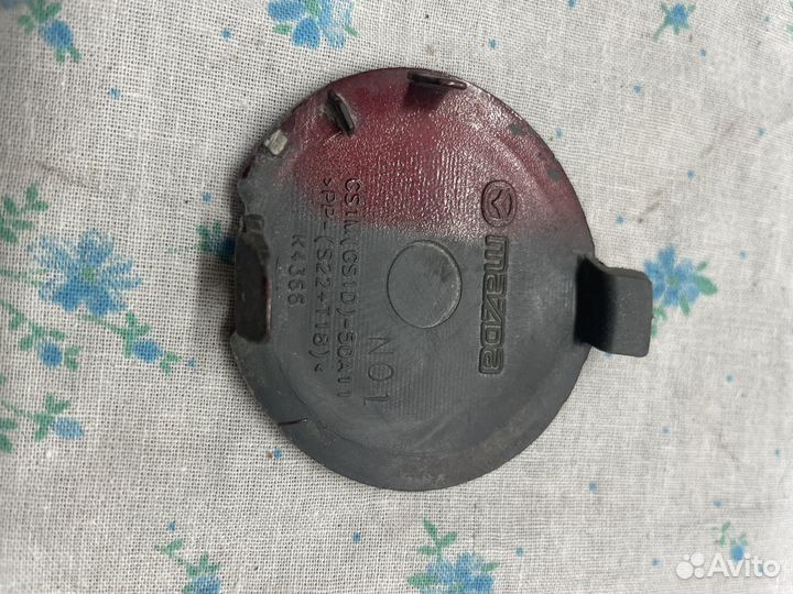 Заглушка бампера mazda