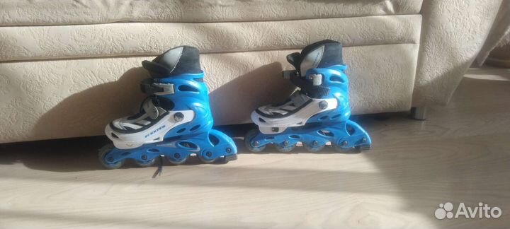 Роликовые коньки