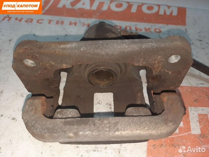 Суппорт тормозной задний левый Nissan X-Trail T31