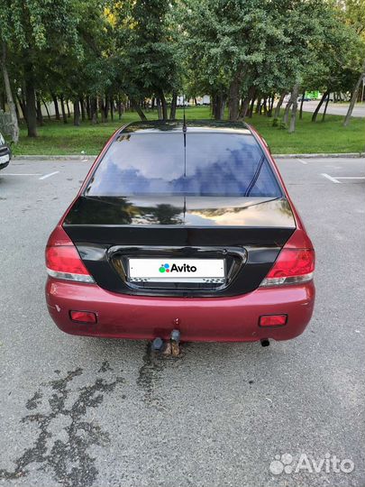 Mitsubishi Lancer 1.6 МТ, 2006, 155 000 км