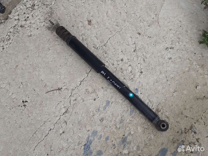 Стойка амортизатора задний Renault Sandero 2