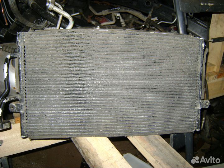 Радиатор кондиционера Mitsubishi Carisma Каризма