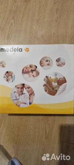 Молокоотсос medela электрический