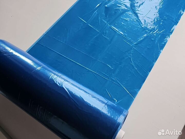 Фартуки пластиковые в рулоне 54х80 200 шт