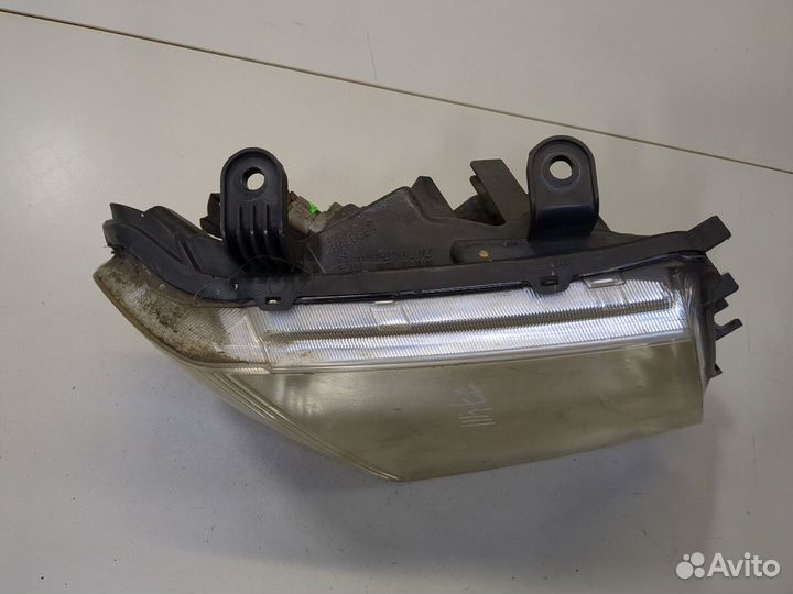 Фара (передняя) Nissan Navara, 2006