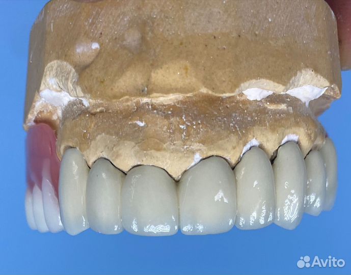 Зубной техник