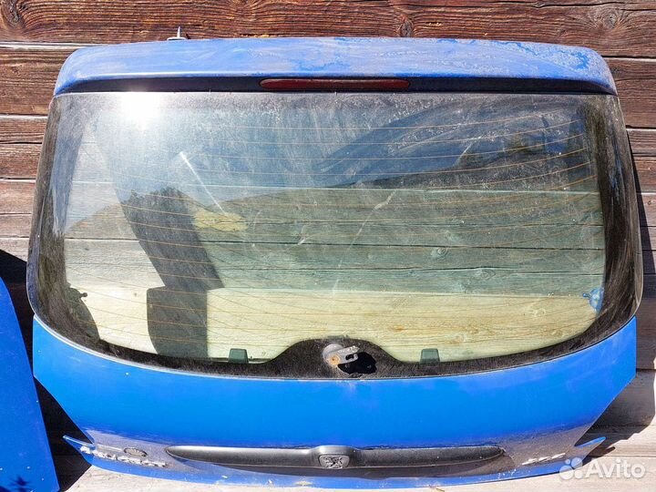 Задняя дверь хлопушка Пежо 206