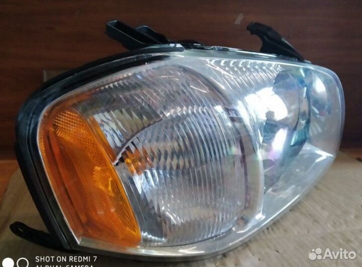 Фара правая Mazda Tribute 2001-2004