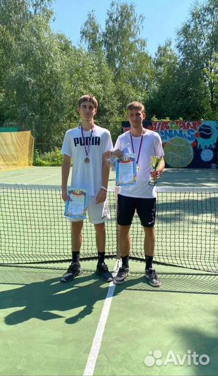 Тренер по большому теннису