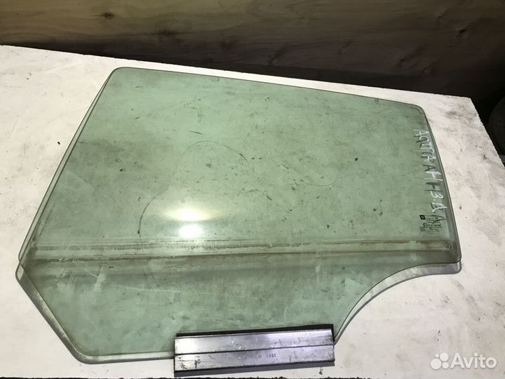 Стекло заднее левое Opel Astra H