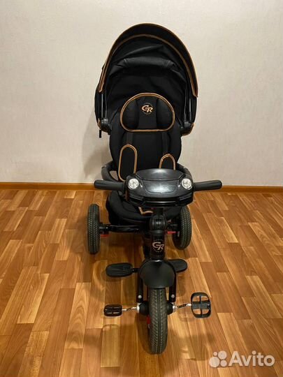 Велосипед-коляска с родительской ручкой