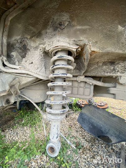 Стойка подвески задняя левая Geely Emgrand ес7