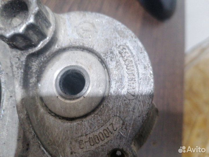 Натяжной ролик поликлиновой ремень Opel Astra H