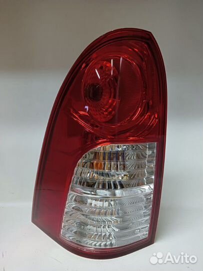 Фонарь левый Ssangyong Actyon Sports 1