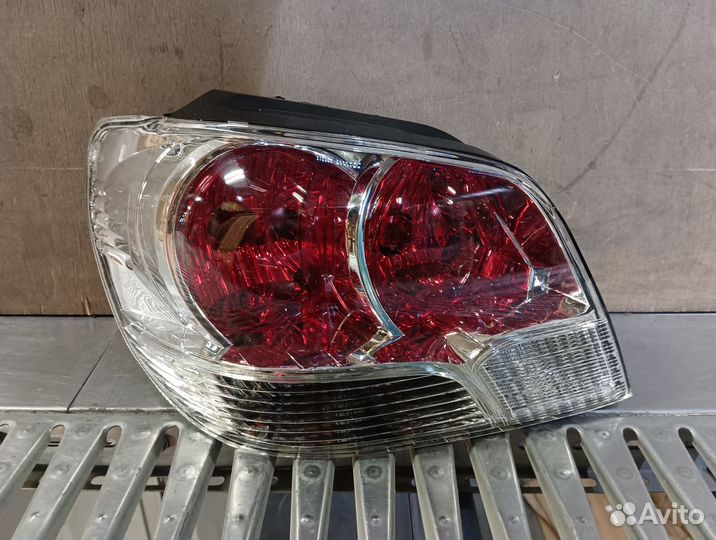 Фонарь левый Mitsubishi Outlander 1 2003-2008