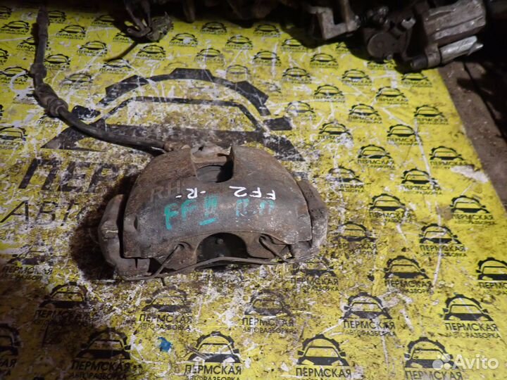 Суппорт тормозной передний правый Ford Focus 2