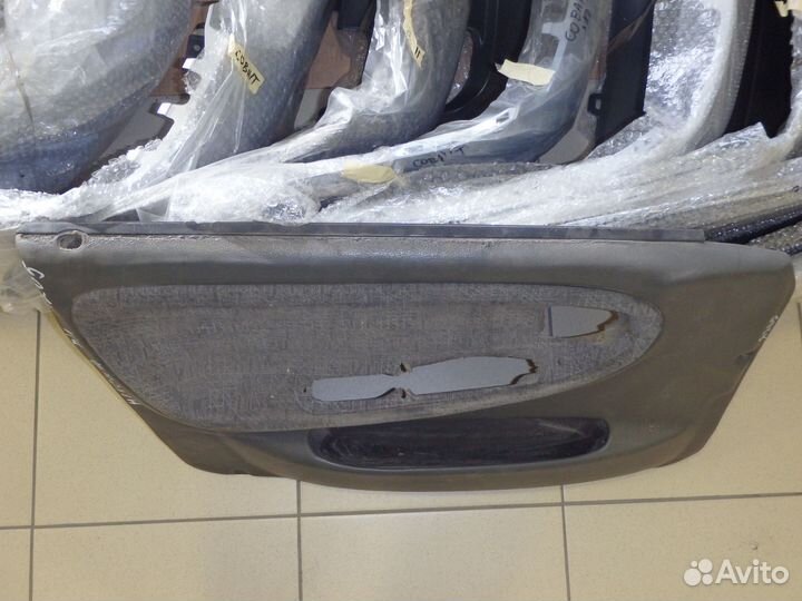 Обшивка двери передней левой Nexia N100